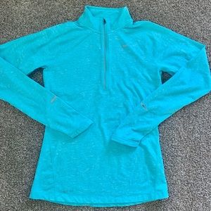 Tiff. Blue Nike quarter zip long sleeve
